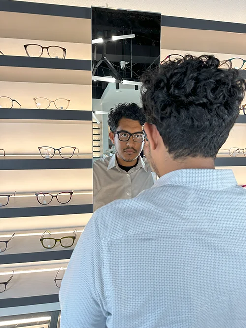 Man choosing glasses